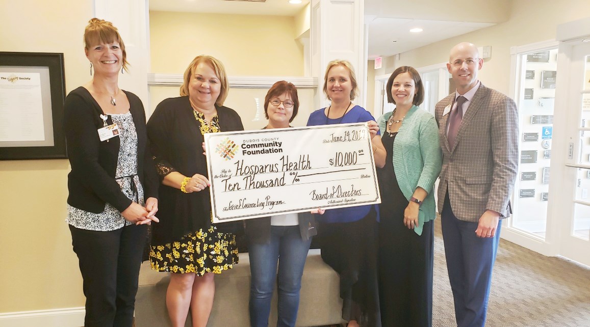 PHOTO, L-R: Hosparus Health's Community Director Kim Ruttle and Outreach Manager Lindsay Berger, Dubois County Community Foundation Associate Director Nona Baker; Hosparus Health Grief Counselor Lori Friestrom, Child & Adolescent Counselor Jacquelyn Love and Chief Strategy Officer Scott Herrmann