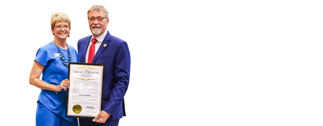 Representative Jim Pressel Presents Maggi Spartz with Circle of Corydon Award