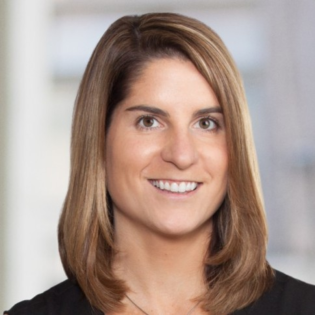 Lauren Box, a Caucasian woman with short brown hair